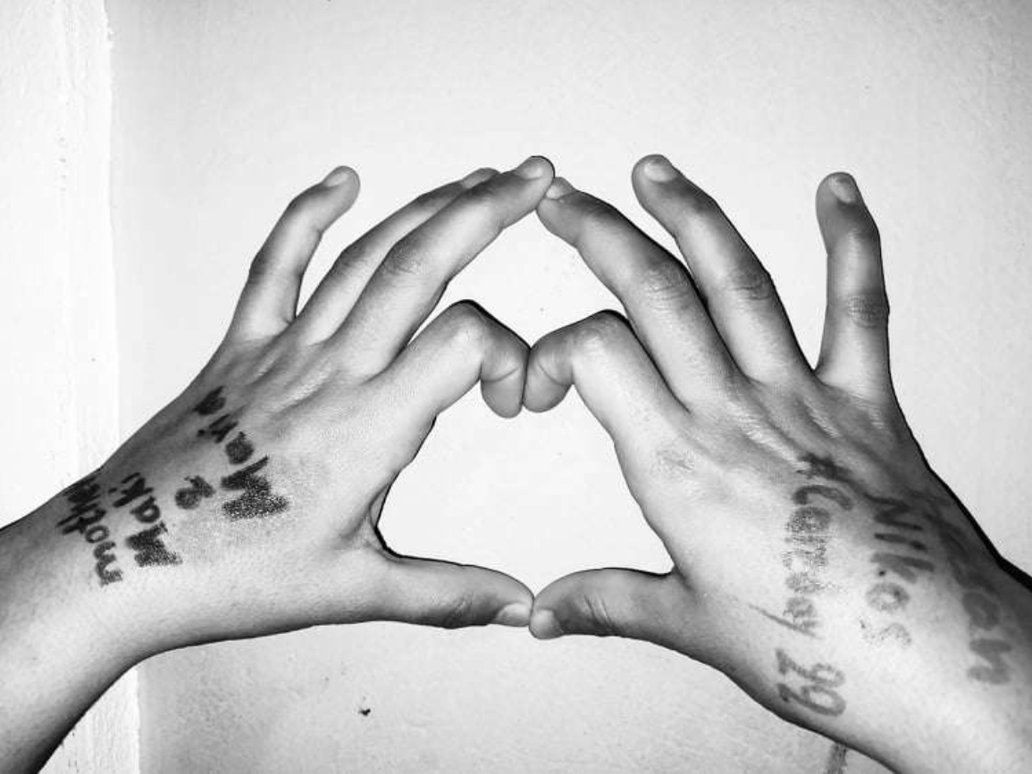 Hands with the hashtags #CareDay22 and #CareAware written on it